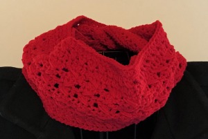 A handmade scarf around the neck