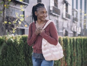 Girl with a crochet bag on her shoulder